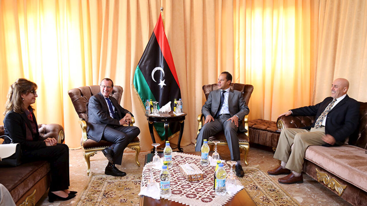 LIBYA-POLITICS/ United Nations envoy to Libya Martin Kobler (2nd L) waits to meet Aguila Saleh, head of the internationally-recognised Libyan parliament, in Tobruk, Libya, April 18, 2016. REUTERS/Stringer - RTX2AKQX