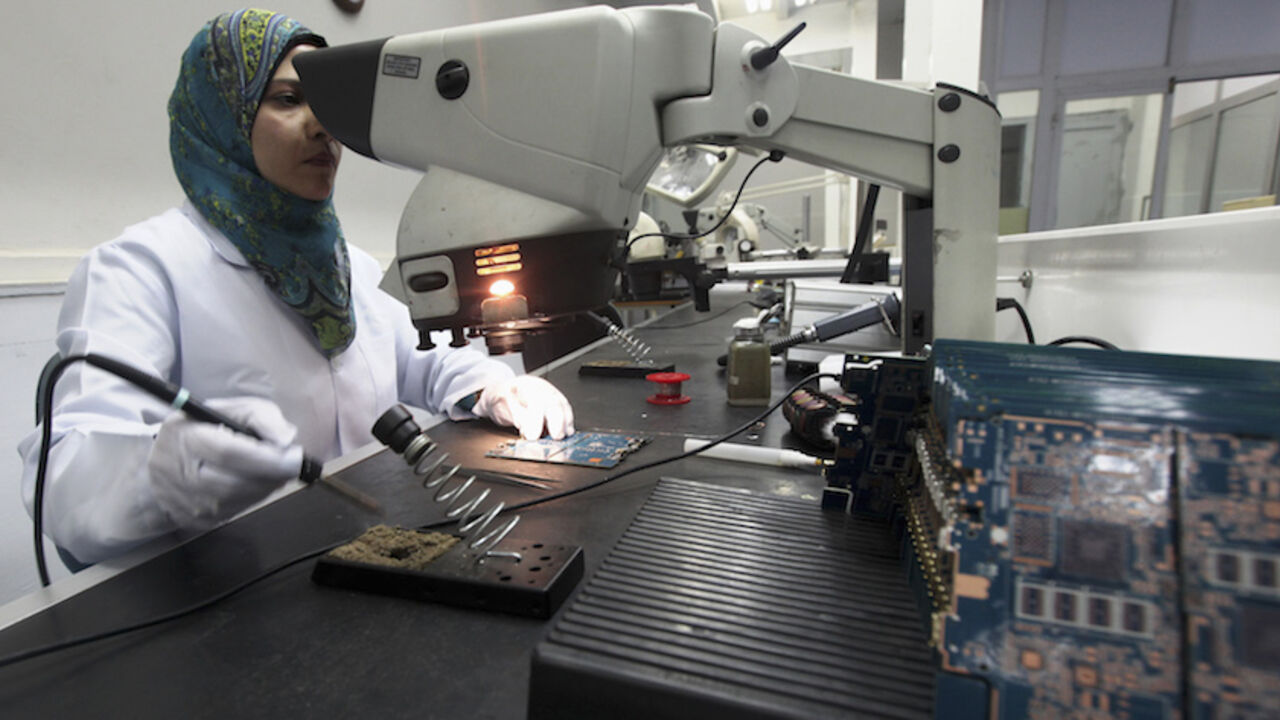 EGYPT-TABLET/COMPUTER A worker checks Egypt's first tablet computer "Inar" in Benha May 18, 2013. Egypt has produced its very first tablet computer "Inar", part of a national project to distribute the device to students in schools and universities around the country. The Ministry of Military Production in collaboration with the Ministry of Communications presented the scheme last year to Benha Electronics Company known as 'Katron' to manufacture the tablet. Picture taken May 18, 2013. REUTERS/Mohamed Abd El Ghany (EGYPT - Tag