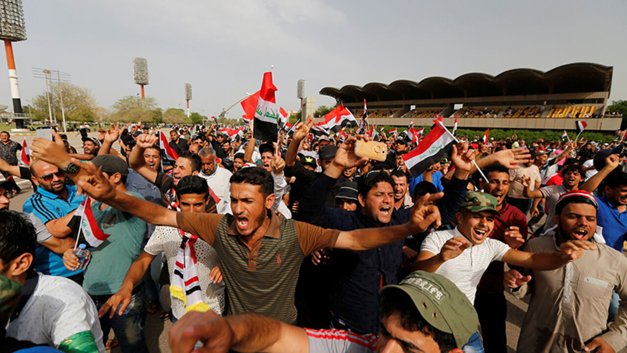 Followers of Iraq's Shi'ite cleric Moqtada al-Sadr shout slogans at Grand Festivities Square within the Green Zone in Baghdad, Iraq, May 1, 2016. REUTERS/Thaier Al-Sudani - RTX2CCQK