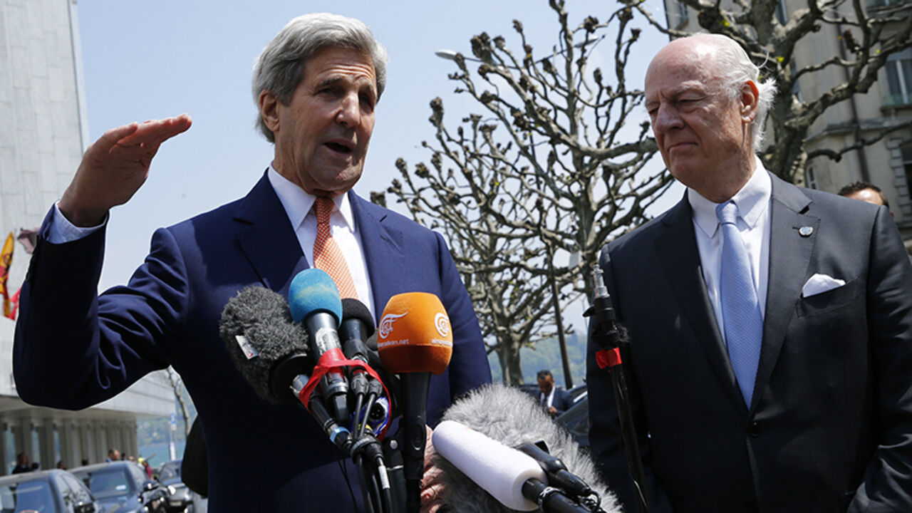 MIDEAST-CRISIS/KERRY U.S. Secretary of State John Kerry (L) gestures next to United Nations Special Envoy on Syria Staffan de Mistura during a news conference in Geneva, Switzerland May 2, 2016. REUTERS/Denis Balibouse - RTX2CF6Z