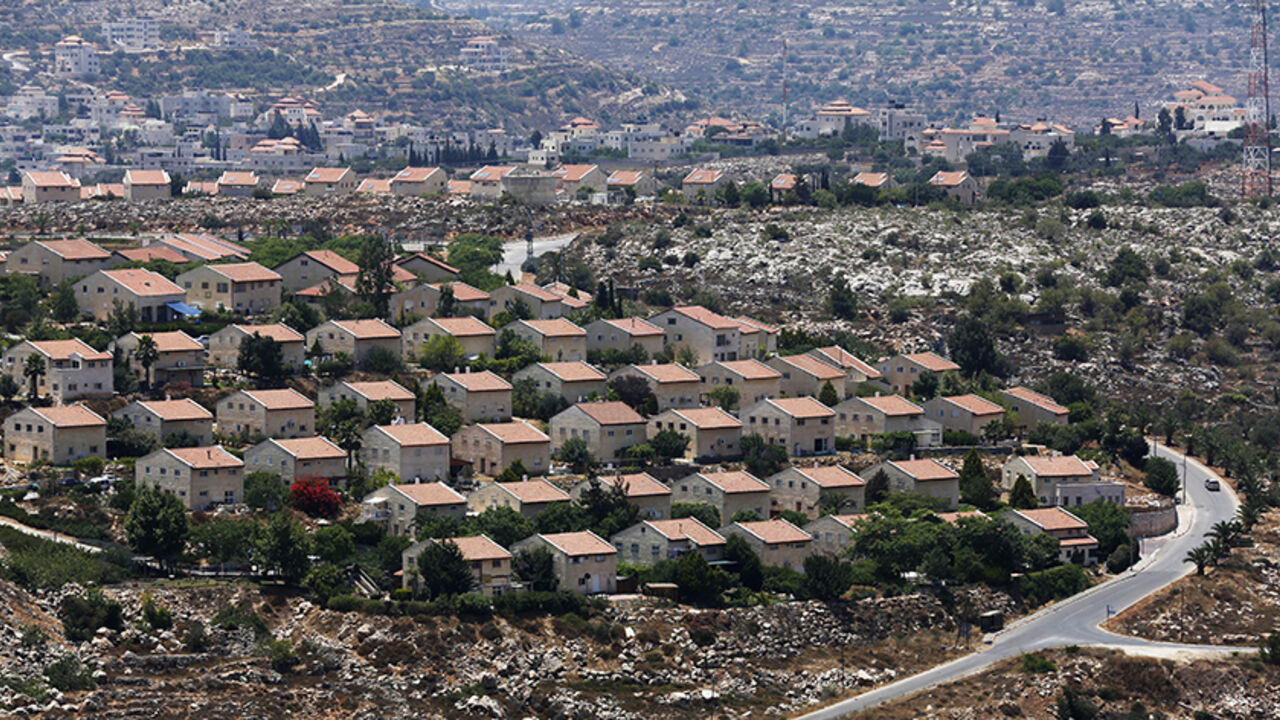 PALESTINIANS-ISRAEL/KERRY Houses are seen in the West Bank Jewish settlement of Ofra, north of Ramallah July 18, 2013. Negotiations between Israel and the Palestinians, which have ebbed and flowed for two decades, last broke down in late 2010, after a partial settlement halt meant to foster talks ended and Israeli Prime Minister Benjamin Netanyahu refused to extend it. Palestinians familiar with Palestinian President Mahmoud Abbas' thinking speculated he might now forgo the demand for a settlement moratorium given a recent slowdown