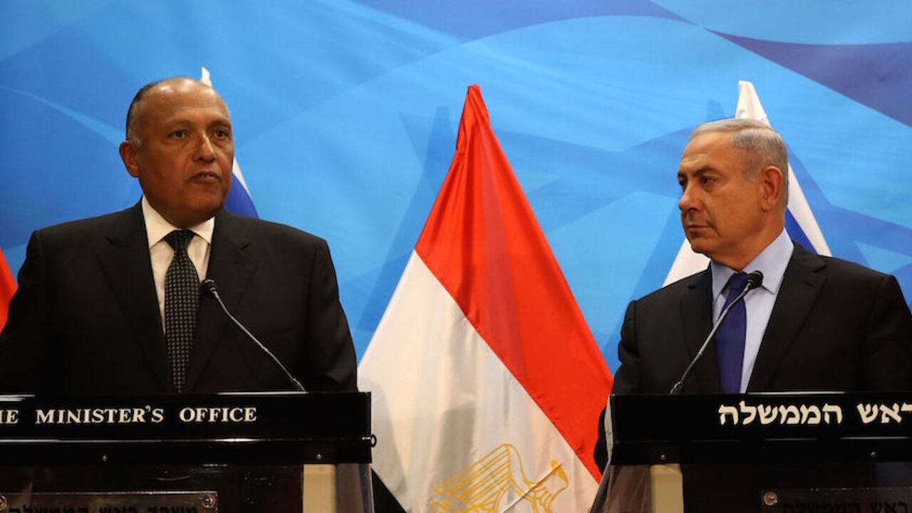 Israeli Prime Minister Benjamin Netanyahu (R) gives a joint statement with Egyptian Foreign Minister Sameh Shoukry prior to their meeting at his Jerusalem office on July 10, 2016.
Shoukry met Netanyahu in Jerusalem for talks on reviving peace efforts with the Palestinians, in the first such visit in nearly a decade and the latest sign of warming ties.

 / AFP / GALI TIBBON        (Photo credit should read GALI TIBBON/AFP/Getty Images)
