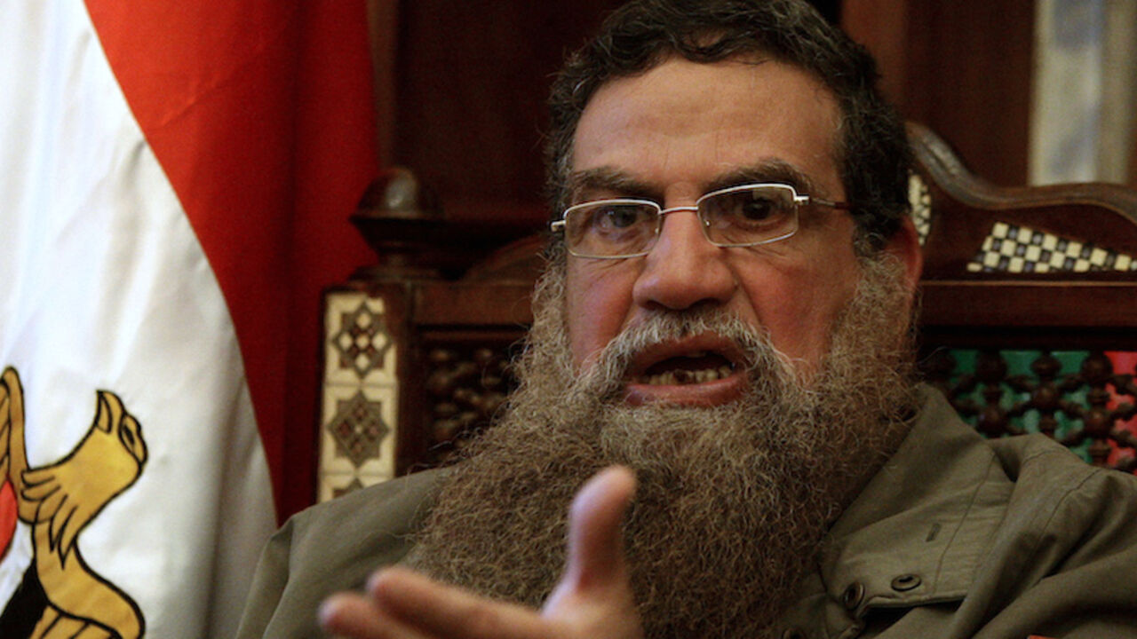 EGYPT/ISLAMIST-MILITANCY Abboud al-Zumar speaks during an interview with Reuters in his home after his release from Liman Tora Prison at Helwan, south of Cairo, March 17, 2011. Abboud al-Zumar went to jail 30 years ago for his role in killing Egyptian President Anwar Sadat. Now a free man, he believes democracy will prevent Islamists from ever again taking up the gun against the state. Picture taken March 17, 2011. To match feature EGYPT/ISLAMIST-MILITANCY REUTERS/Mohamed Abd El-Ghany (EGYPT - Tags: POLITICS RELIGION H