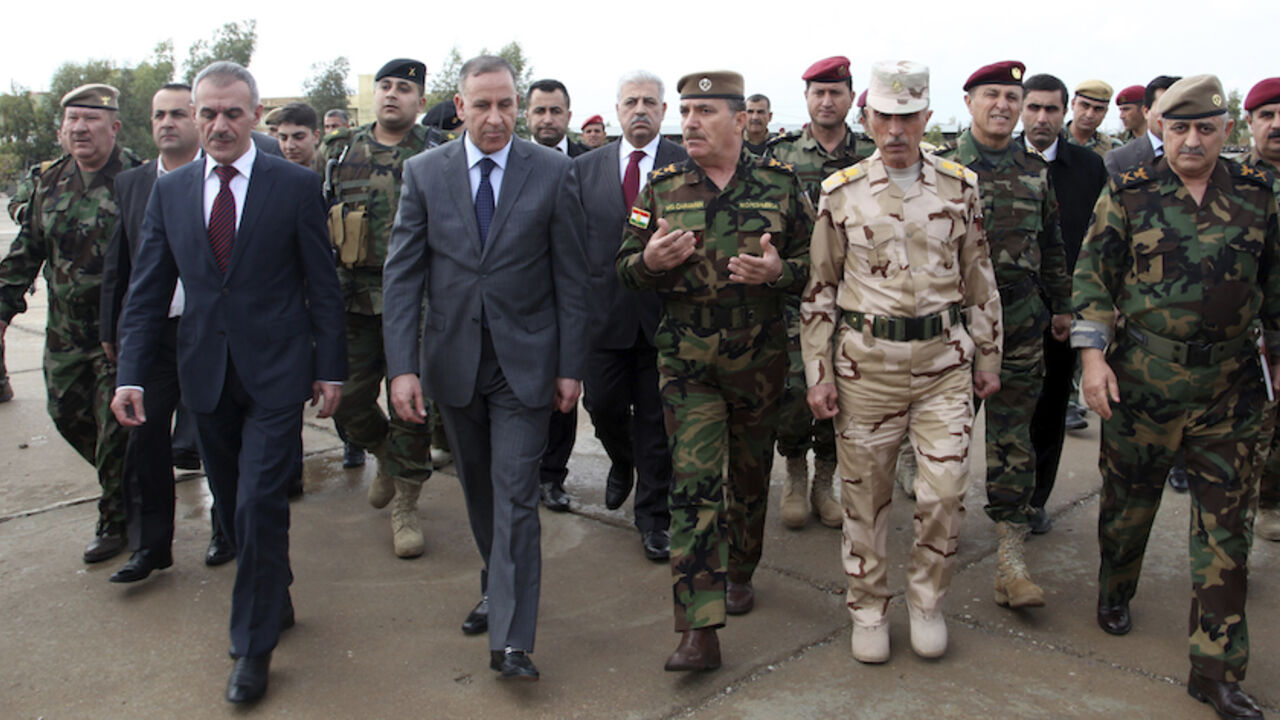 Iraqi defence minister Khaled al-Obeidi (2nd L) visits a training camp for Kurdish peshmerga troops in Arbil Iraqi defence minister Khaled al-Obeidi (2nd L) visits a training camp for Kurdish peshmerga troops in Arbil, November 3, 2014. REUTERS/Azad Lashkari (IRAQ - Tags: CIVIL UNREST POLITICS MILITARY) - RTR4COAG