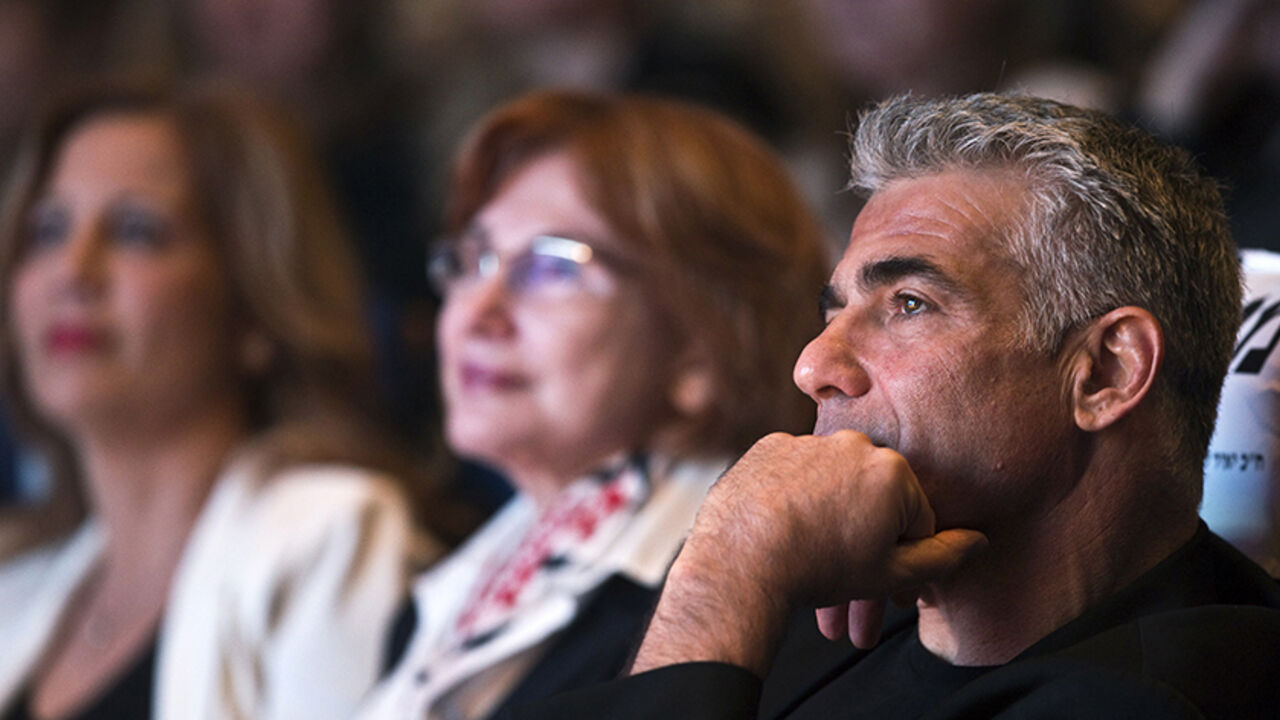 ISRAEL-ELECTION/LAPID Yesh Atid leader Yair Lapid attends a women's committee convention in Tel Aviv March 1, 2015. The era of Prime Minister Benjamin Netanyahu is ending, with Israeli voters clearly more concerned about economic and social issues than about security or fears over Iran, a leading election candidate said on Monday. Lapid, a telegenic former news anchor and TV host, leads the centrist, secular Yesh Atid party ("There's a Future"), which emerged out of the cost-of-living protests that swept Israel in 2011. Picture