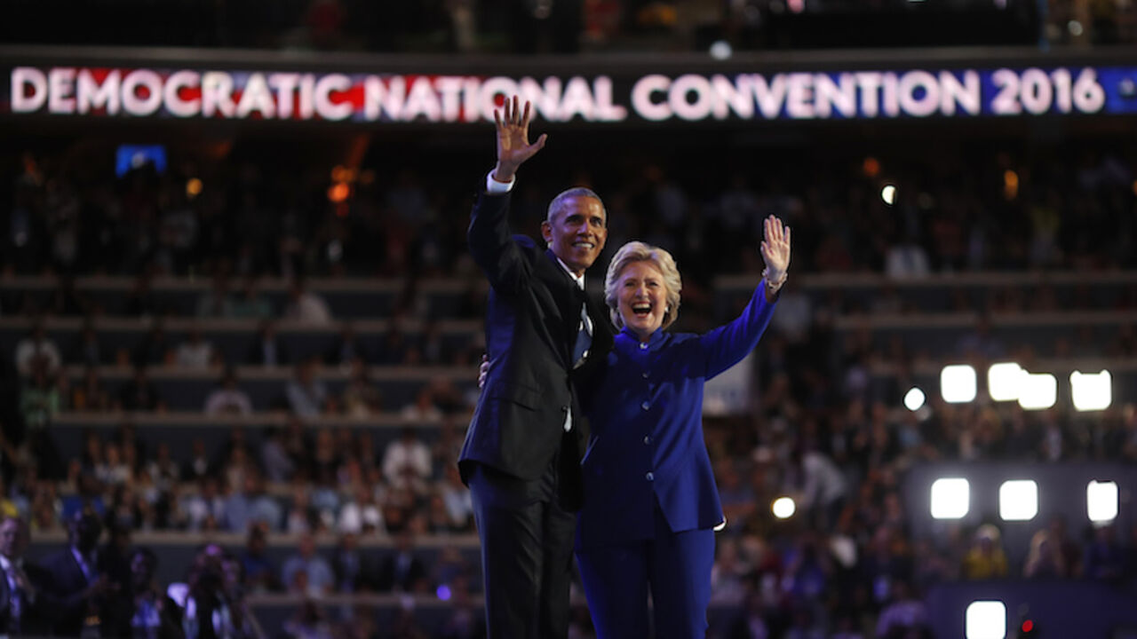 U.S. President Obama and Democratic presidential nominee Clinton appear onstage together after his speech on the third night at the Democratic National Convention in Philadelphia U.S. President Barack Obama and Democratic presidential nominee Hillary Clinton appear onstage together after his speech on the third night at the Democratic National Convention in Philadelphia, Pennsylvania, U.S. July 27, 2016. REUTERS/Carlos Barria - RTSK0DG