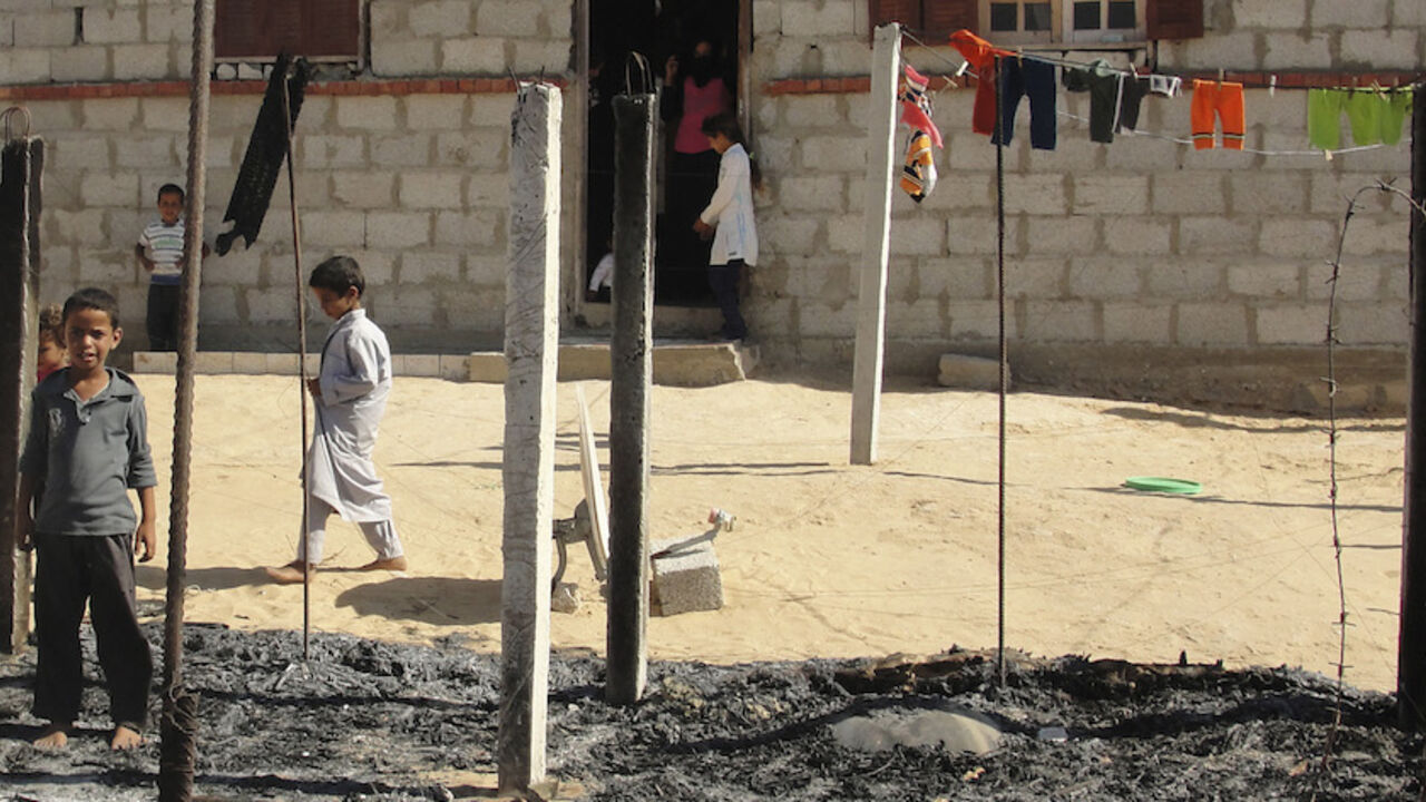 Boys look at a burnt area around a house after assaults on militant targets by the Egyptian Army, in a village on the outskirts of Sheikh Zuweid Boys look at a burnt area around a house after assaults on militant targets by the Egyptian Army, in a village on the outskirts of Sheikh Zuweid, near the city of El-Arish in Egypt's Sinai peninsula September 10, 2013. Egypt has tightened control of crossings from the Sinai peninsula and continued assaults on militants after an Islamist group based there said it tried to kill the interior minister in Cairo last week, the state news agency reported on Monday. REUTERS/Stringer (EGYPT - Tags: POLITICS CIVIL U