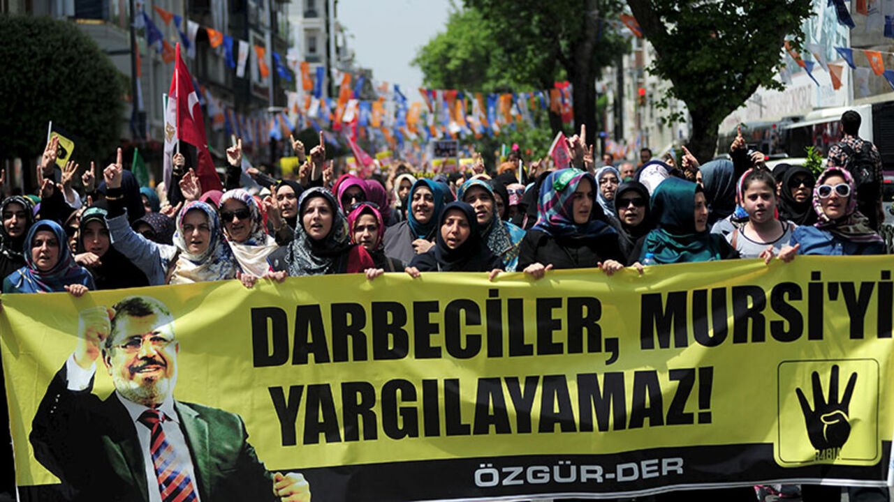 EGYPT-COURT/MURSI Pro-Islamist demonstrators hold a banner that reads "Coup leaders can't trial Mursi" during a protest in support former President Mohamed Mursi at the courtyard of Fatih mosque in Istanbul, Turkey, May 17, 2015. An Egyptian court on Saturday sought the death penalty for former president Mohamed Mursi and 106 supporters of his Muslim Brotherhood in connection with a mass jail break in 2011. Mursi and his fellow defendants, including top Brotherhood leader Mohamed Badie, were convicted for killing and kidnapp