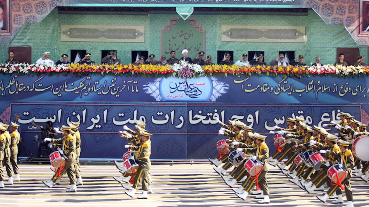 Members of the Iranian Army march past President Hassan Rouhani (C top) and military commanders during a parade marking the anniversary of the Iran-Iraq war (1980-88), in Tehran September 22, 2015. REUTERS/Raheb Homavandi/TIMA ATTENTION EDITORS - THIS PICTURE WAS PROVIDED BY A THIRD PARTY. REUTERS IS UNABLE TO INDEPENDENTLY VERIFY THE AUTHENTICITY, CONTENT, LOCATION OR DATE OF THIS IMAGE. FOR EDITORIAL USE ONLY. NOT FOR SALE FOR MARKETING OR ADVERTISING CAMPAIGNS. NO THIRD PARTY SALES. NOT FOR USE BY REUTER