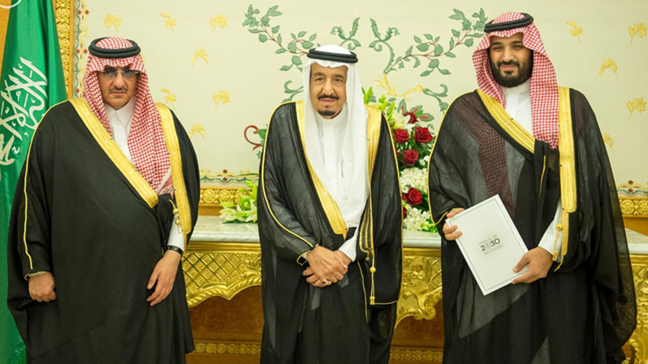 SAUDI-PLAN/PRINCE (L-R) Saudi Crown Prince Mohammed bin Nayef, Saudi King Salman, and Saudi Arabia's Deputy Crown Prince Mohammed bin Salman stand together as Saudi Arabia's cabinet agrees to implement a broad reform plan known as Vision 2030 in Riyadh, April 25, 2016. To match Insight SAUDI-PLAN/PRINCE Saudi Press Agency/Handout/File Photo via REUTERS. ATTENTION EDITORS - THIS IMAGE WAS PROVIDED BY A THIRD PARTY. EDITORIAL USE ONLY. NO RESALES. NO ARCHIVE. - RTX2CU2M