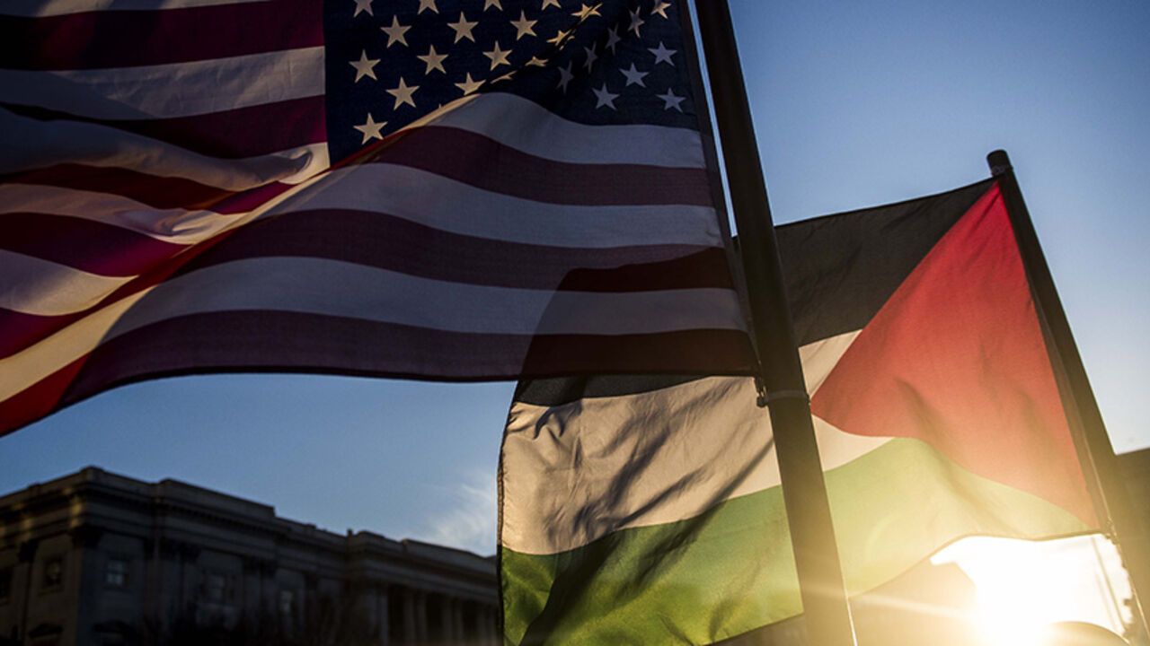 89873503 WASHINGTON, DC - MARCH 21: American and Palestinian flags wave outside of the Verizon Center during the American Israel Public Affairs Committee (AIPAC) conference on March 21, 2016 in Washington, D.C. Presidential candidates from both parties gathered in Washington to pitch their plans for Israel. (Photo by Gabriella Demczuk/Getty Images)