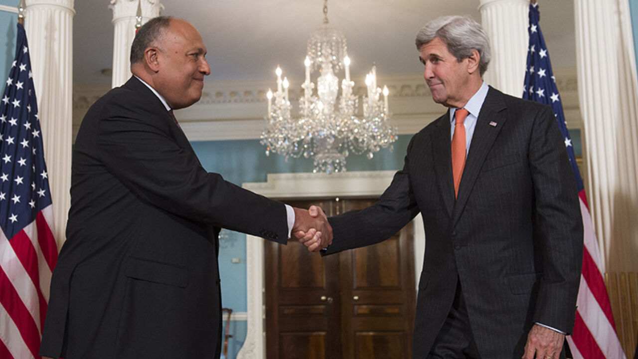 AFP_DF8SS US Secretary of State John Kerry shakes hands with Egyptian Foreign Minister Sameh Hassan Shoukry (L) at the State Department in Washington, DC, July 21, 2016. / AFP / SAUL LOEB (Photo credit should read SAUL LOEB/AFP/Getty Images)
