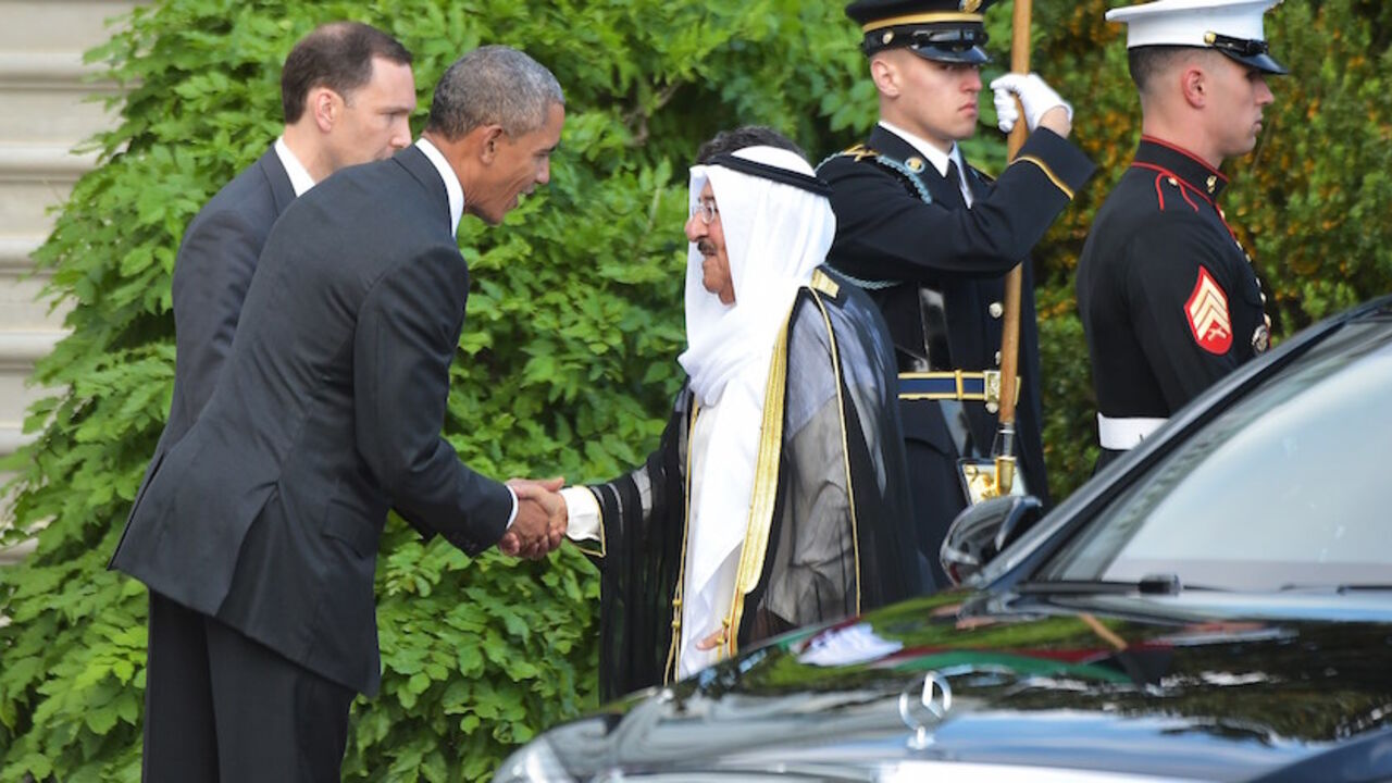 Was8926892 US President Barack Obama greets Kuwait's Emir Sheikh Sabah al-Ahmed al-Sabah on the South Lawn as he welcomes members of the Gulf Cooperation Council to the White House for a dinner on May 13, 2015 in Washington, DC. AFP PHOTO/MANDEL NGAN (Photo credit should read MANDEL NGAN/AFP/Getty Images)
