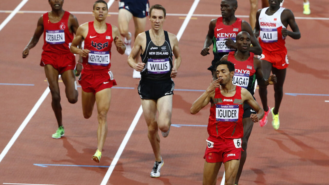 Morocco's Abdalaati Iguider finishes first in his men's 1500m semi-final during the London 2012 Olympic Games at the Olympic Stadium Morocco's Abdalaati Iguider (front) finishes first in his men's 1500m semi-final during the London 2012 Olympic Games at the Olympic Stadium August 5, 2012. REUTERS/David Gray (BRITAIN - Tags: OLYMPICS SPORT ATHLETICS) - RTR367XZ