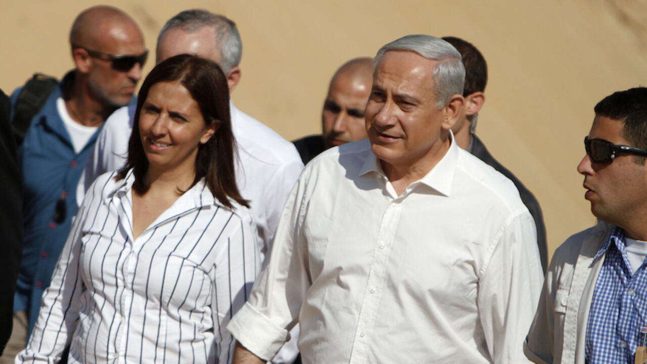 Israel's Prime Minister Netanyahu tours a planned site for the construction of a hospital in Ashdod Israel's Prime Minister Benjamin Netanyahu (2nd R) and Knesset member Gila Gamliel (L) tour a planned site for the construction of a hospital during a corner stone laying ceremony in the port city of Ashdod November 8, 2012. REUTERS/Amir Cohen (ISRAEL - Tags: POLITICS HEALTH) - RTR3A5T8