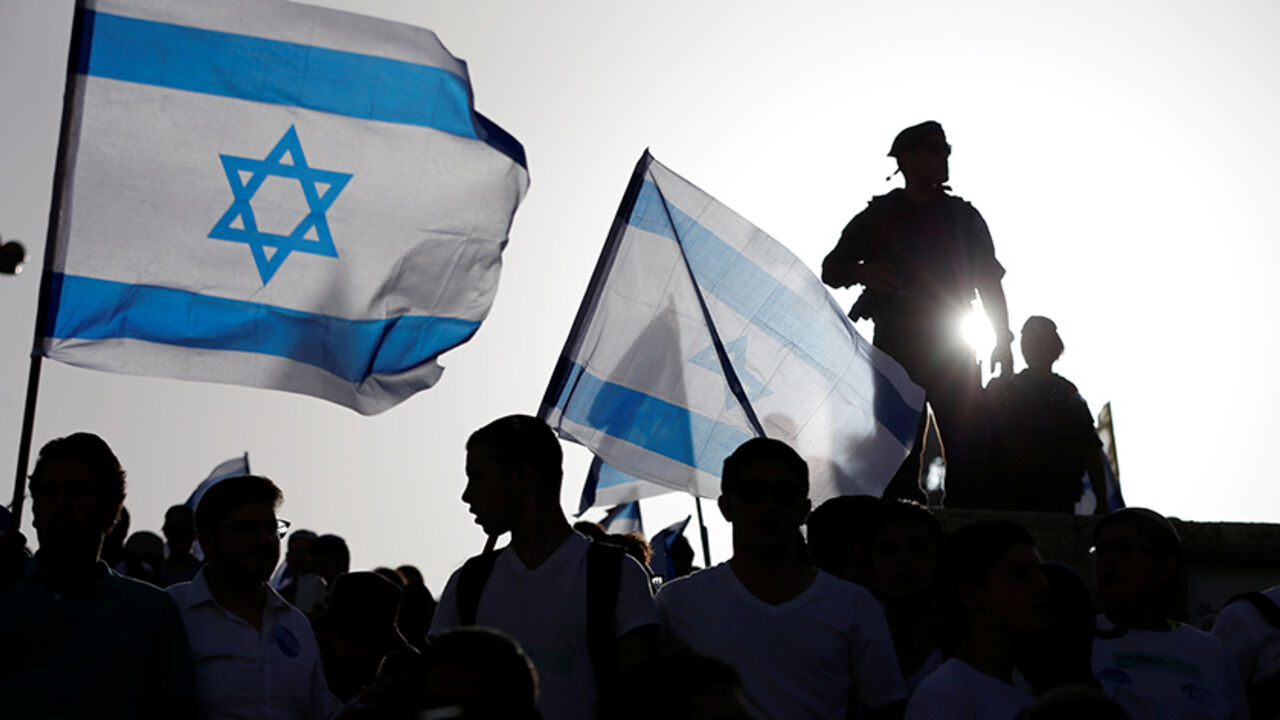ISRAEL-PALESTINIANS/JERUSALEM DAY An Israeli security personal stands guard during a march marking Jerusalem Day, the anniversary of Israel's capture of East Jerusalem during the 1967 Middle East war, outside Jerusalem's Old City June 5, 2016. REUTERS/Ammar Awad - RTSG3Z9
