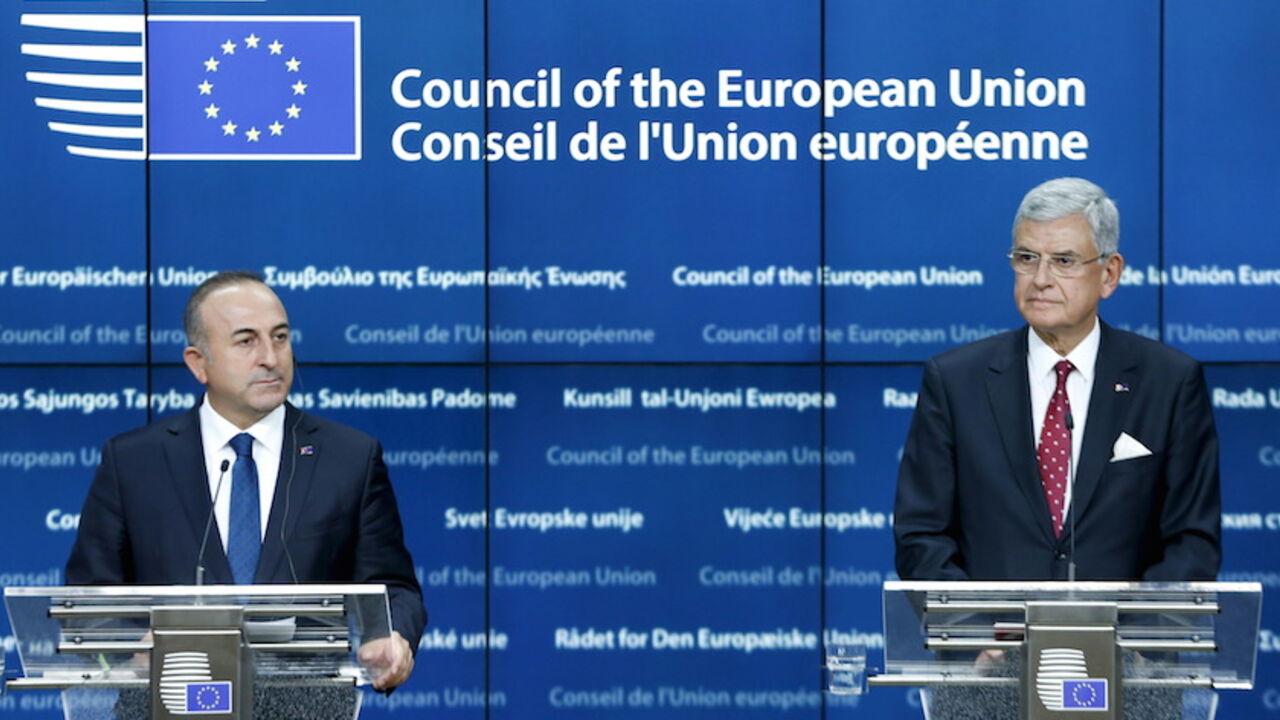 Turkey's Foreign Minister Cavusoglu and EU Affairs Minister Bozkir attends a news conference after a EU-Turkey accession conference in Brussels Turkey's Foreign Minister Mevlut Cavusoglu and EU Affairs Minister Volkan Bozkir (R) attend a joint news conference after a European Union-Turkey accession conference in Brussels, Belgium, December 14, 2015. REUTERS/Francois Lenoir - RTX1YNPC
