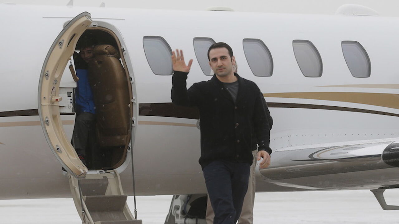 Former U.S. Marine Amir Hekmati, recently released from an Iranian prison, arrives at an airport in Flint, Michigan Former U.S. Marine Amir Hekmati, recently released from an Iranian prison, arrives at an airport in Flint, Michigan January 21, 2016. REUTERS/Rebecca Cook TPX IMAGES OF THE DAY - RTX23GED