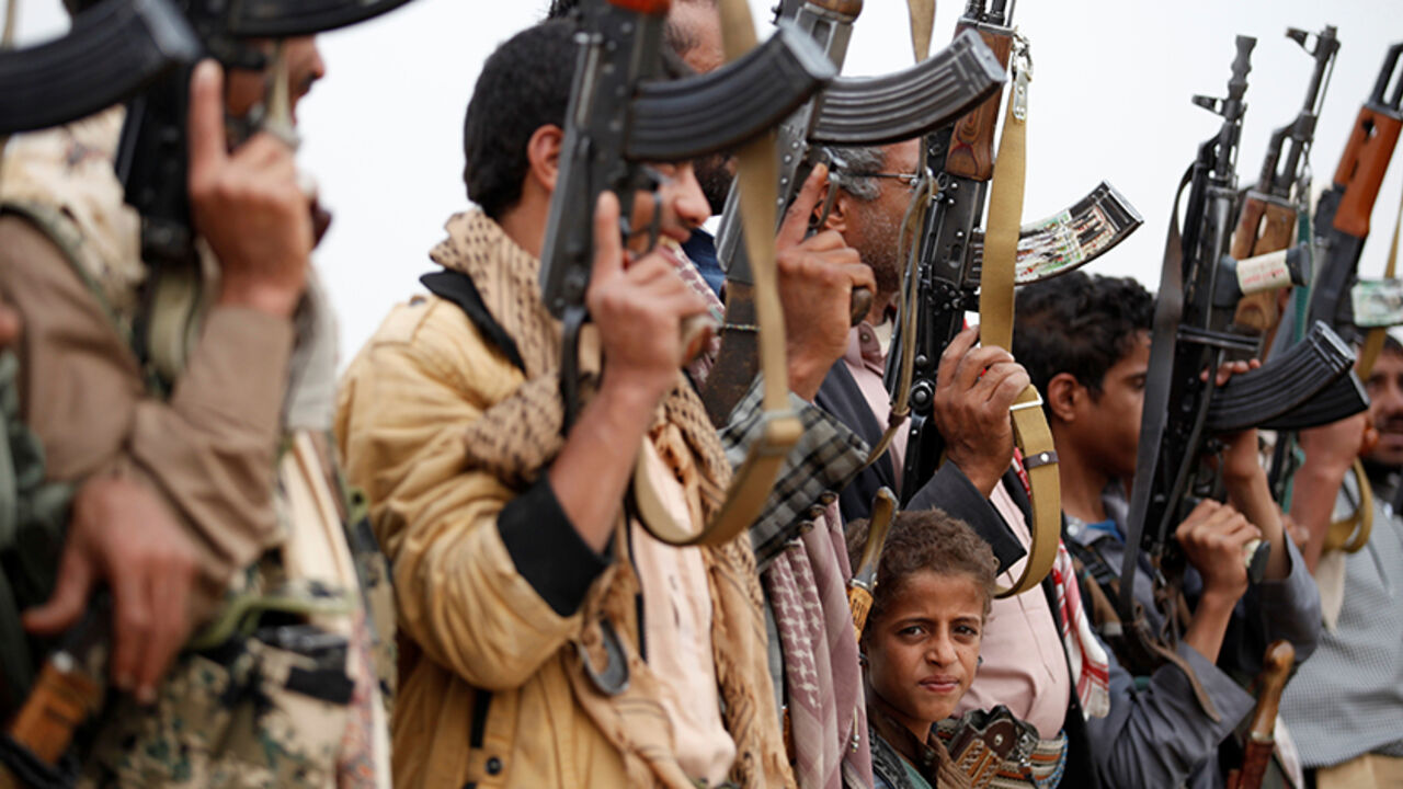 YEMEN-SECURITY/ A boy looks as he attends a gathering held by tribesmen loyal to the Houthi movement to show support to a political council formed by the movement and the General People's Congress party to unilaterally rule Yemen by both groups in Sanaa, August 14, 2016. REUTERS/Khaled Abdullah - RTX2KP2M
