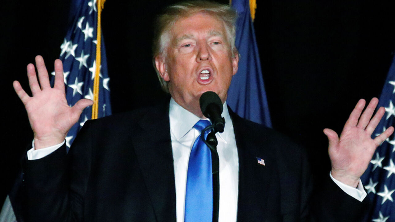 USA-ELECTION/TRUMP Republican presidential nominee Donald Trump speaks at a campaign rally in Manchester, New Hampshire, U.S., August 25, 2016. REUTERS/Carlo Allegri - RTX2N2RQ