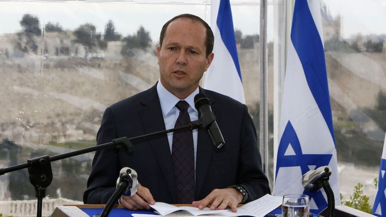 ISRAEL-POLITICS-JERUSALEM-NETANYAHU-SECURITY Backdropped by Jerusalem's Old City Ottoman walls, Jerusalem's mayor Nir Barkat speaks during a joint press conference with Israeli Prime Minister Benjamin Netanyahu (unseen) on February 23, 2015, a day after Barkat and his bodyguard apprehended a young Palestinian who stabbed an ultra-Orthodox Jew in Jerusalem. AFP PHOTO / GALI TIBBON (Photo credit should read GALI TIBBON/AFP/Getty Images)