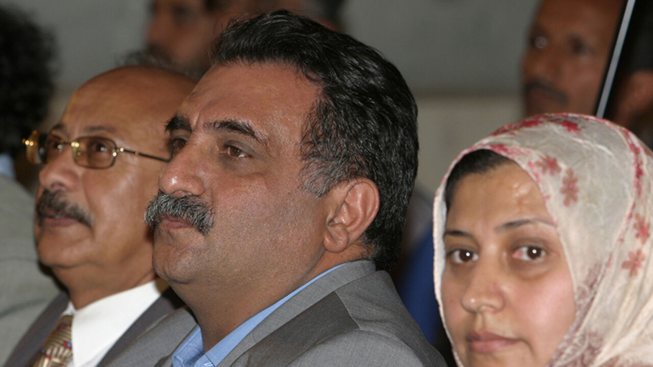 YEMEN Israeli Arab lawmaker Azmi Bishara (C) attends a pro-Palestinian symposium in Sanaa May 16, 2007. Bishara resigned from the Israeli Knesset last April and said he would stay abroad for an unspecified time. REUTERS/Khaled Abdullah (YEMEN) - RTR1PQME