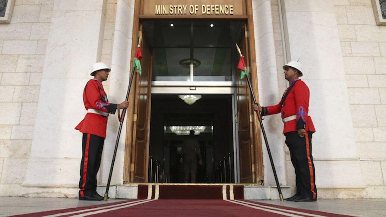 MIDEAST-CRISIS/IRAQ-HAGEL Iraqi guards stand in front of the Ministry of Defence during a visit from U.S. Secretary of Defense Chuck Hagel, in Baghdad December 9, 2014. U.S. Defense Secretary Chuck Hagel arrived in Baghdad on Tuesday as the United States expands its presence and touts progress against Islamic State militants four months after starting a campaign of air strikes in Iraq. REUTERS/Mark Wilson/Pool (IRAQ - Tags: POLITICS MILITARY) - RTR4HCSE