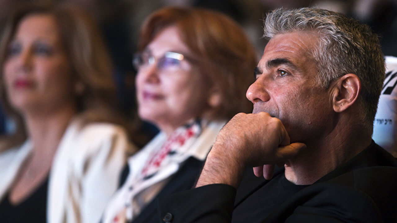 ISRAEL-ELECTION/LAPID Yesh Atid leader Yair Lapid attends a women's committee convention in Tel Aviv March 1, 2015. The era of Prime Minister Benjamin Netanyahu is ending, with Israeli voters clearly more concerned about economic and social issues than about security or fears over Iran, a leading election candidate said on Monday. Lapid, a telegenic former news anchor and TV host, leads the centrist, secular Yesh Atid party ("There's a Future"), which emerged out of the cost-of-living protests that swept Israel in 2011. Picture