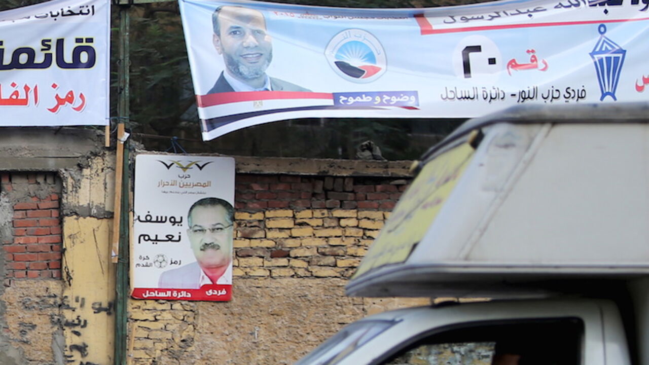 EGYPT-ELECTION/SALAFIS Electoral banners for the Salafist political party "al-Nour" (top) are seen in Shubra area in Cairo during the second day of the second round of Egypt's parliamentary elections, Egypt, November 23, 2015. REUTERS/Mohamed Abd El Ghany - RTX1VH3O
