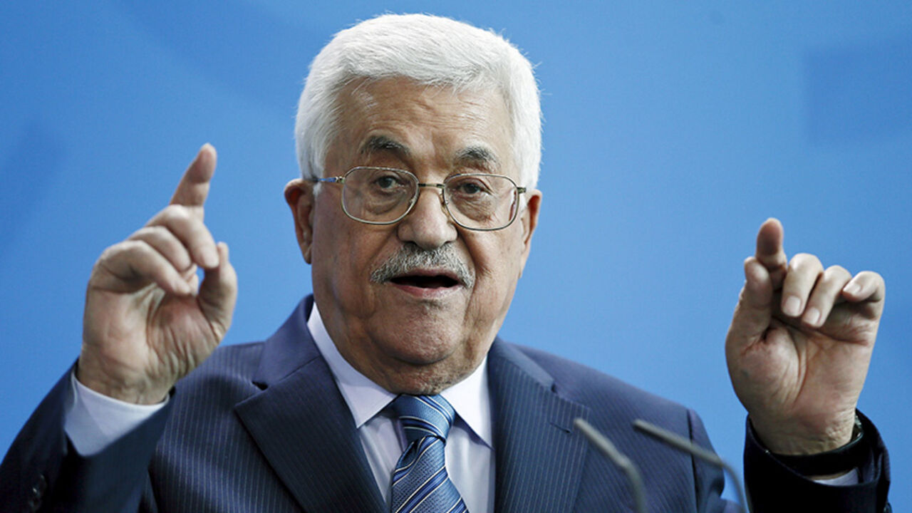 ISRAEL-PALESTINIANS/MERKEL-ABBAS Palestinian President Mahmoud Abbas speaks during a news conference with Chancellor Angela Merkel (unseen) at the Chancellery in Berlin, Germany, April 19, 2016. REUTERS/Hannibal Hanschke - RTX2AOLJ