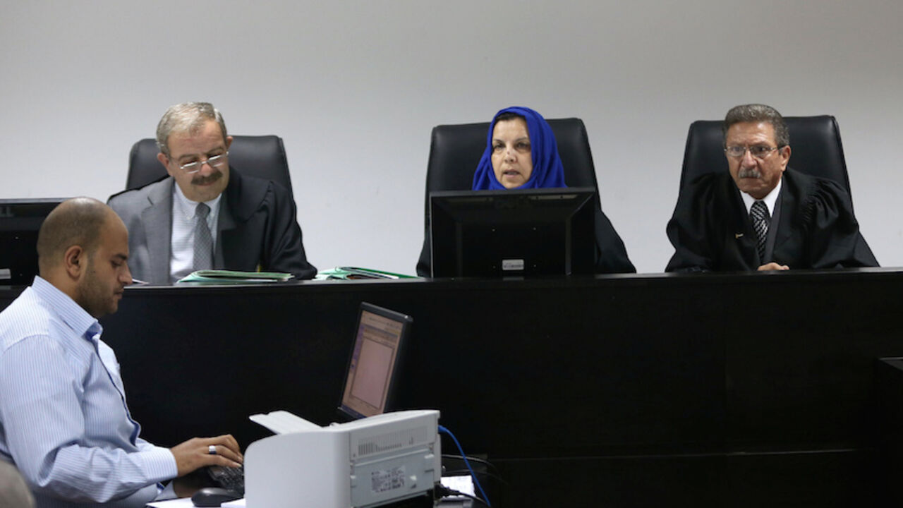 PALESTINIANS-ELECTION/ Palestinian judges discuss a petition to suspend municipal elections, at the High Court office in the West Bank city of Ramallah September 8, 2016. REUTERS/Mohamad Torokman - RTX2ON47