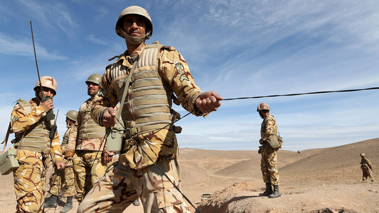 Iranian soldiers participate in military manoeuvres on the outskirts of the northeastern Iranian town of Torbat-E-Jam, near Mashhad, on November 17, 2015. Iran started military manoeuvres to respond to possible attacks by armed groups, such as the Islamic State (IS) group, a military commander said according to ISNA. AFP PHOTO / ISNA / HOSSEIN HOSSEINZADEH        (Photo credit should read HOSSEIN HOSSEINZADEH/AFP/Getty Images)