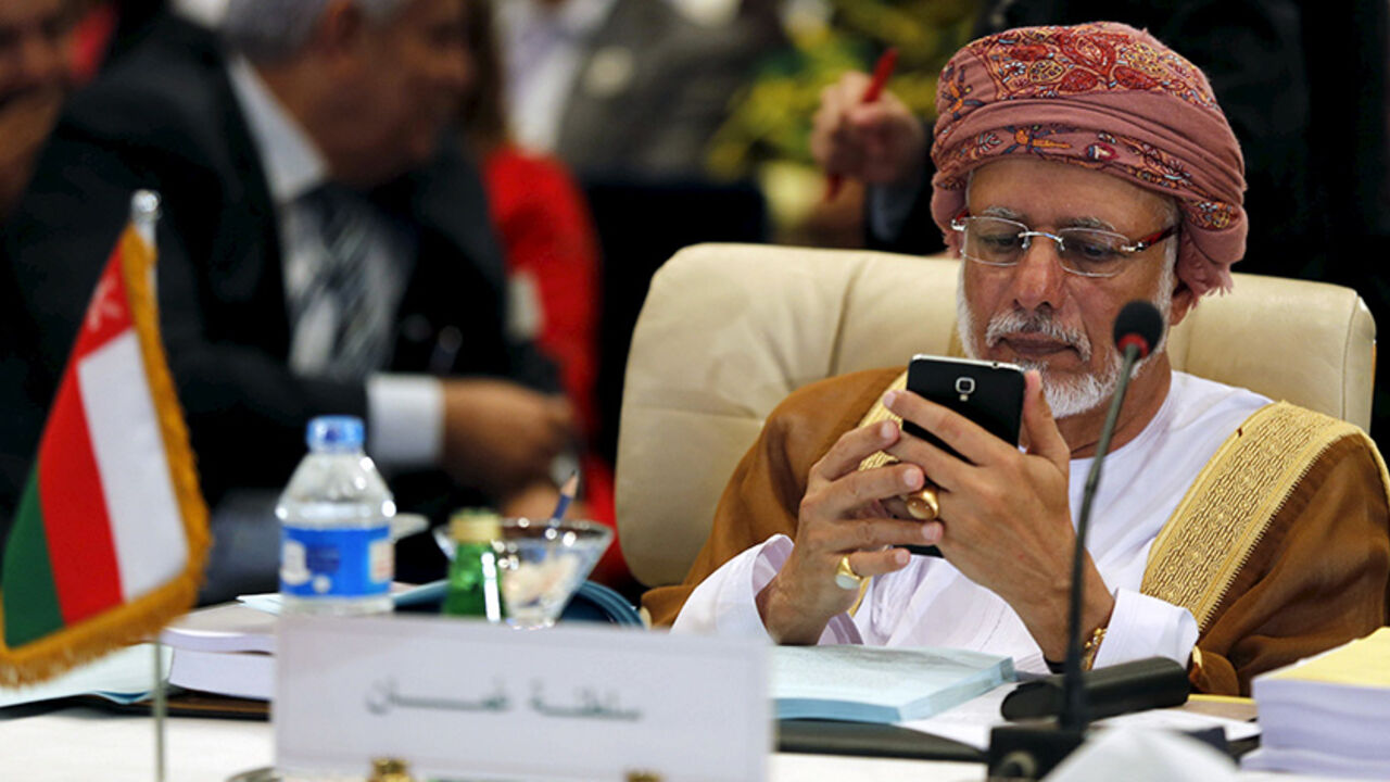 YEMEN-SECURITY/ARABS Oman's Minister of Foreign Affairs Yusuf bin Alawi bin Abdullah looks at his mobile phone at the foreign ministers of the Arab League meeting ahead of the Arab Summit in Sharm el-Sheikh, in the South Sinai governorate March 26, 2015. The Arab League on Thursday pledged full support for the Saudi-led campaign against Shi'ite Houthi fighters in Yemen. REUTERS/Amr Abdallah Dalsh - RTR4UZLE