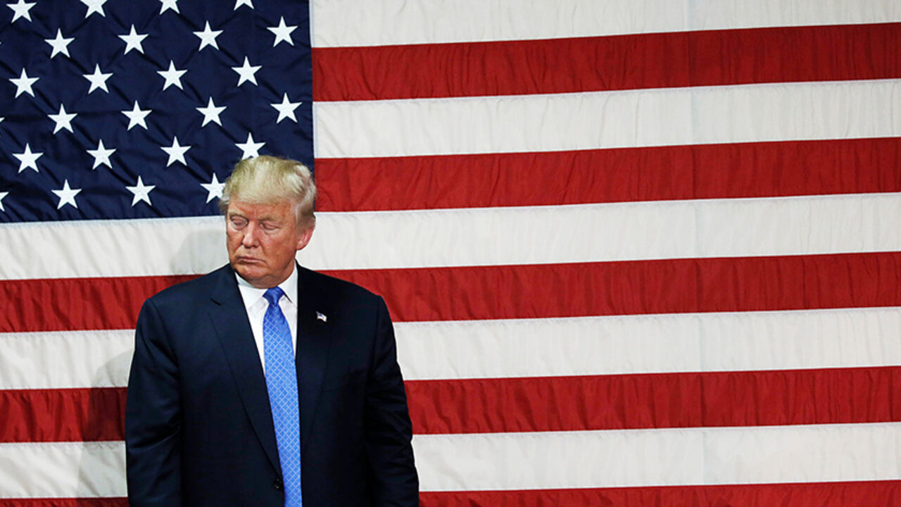 USA-ELECTION/TRUMP Republican presidential nominee Donald Trump pauses as he speaks at a campaign town hall event in Sandown, New Hampshire, U.S., October 6, 2016. REUTERS/Mike Segar - RTSR4I8