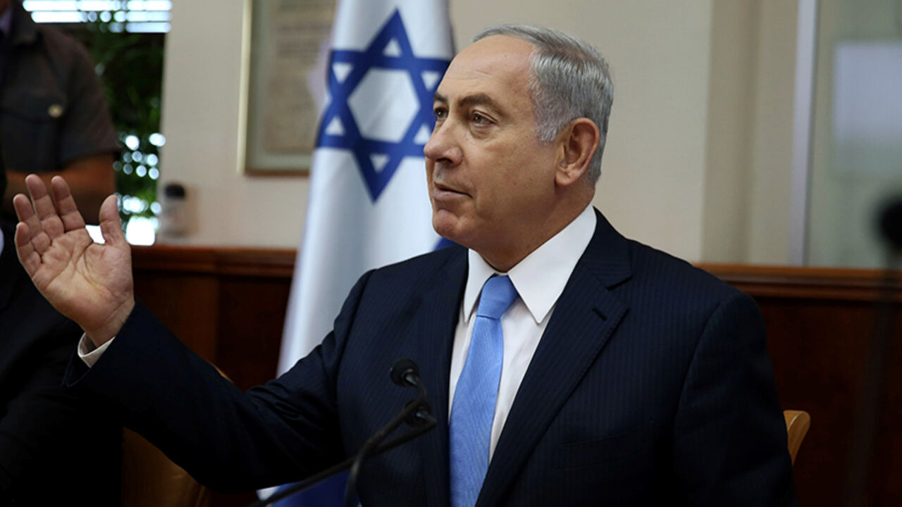ISRAEL-POLITICS/ Israeli Prime Minister Benjamin Netanyahu opens the weekly cabinet meeting at his Jerusalem office moments after he was informed about a shooting attack in Jerusalem October 9, 2016. REUTERS/Gali Tibbon/Pool - RTSRFJT