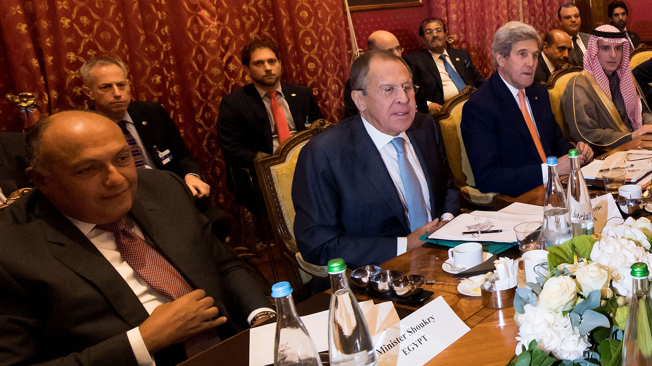 MIDEAST-CRISIS/SYRIA-TALKS (From L-R), Egypt's Foreign Minister Sameh Shoukry, Russia's Foreign Minister Sergei Lavrov, U.S. Secretary of State John Kerry, Saudi Arabia's Foreign Minister Adel al-Jubeir, Qatar's Foreign Minister Sheikh Mohammed bin Abdulrahman al-Thani, Iraq's Foreign Minister Ibrahim al-Jaafari, Iran's Foreign Minister Mohammad Javad Zarif, Staffan de Mistura, UN Special Envoy of the Secretary-General for Syria, Turkey's Foreign Affairs Minister Mevlut Cavusoglu, Jordan's Foreign Minister Nasser Judeh, speak togethe