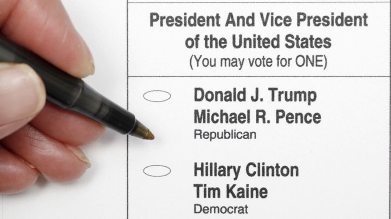 A sample ballot is seen in a photo illustration, as early voting for the 2016 general elections began in North Carolina, in Chapel Hill, North Carolina, U.S. October 20, 2016.   REUTERS/Jonathan Drake - RTX2PS45