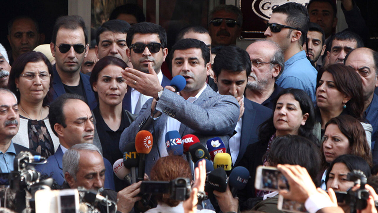 TURKEY-KURDS/ Selahattin Demirtas, co-leader of the pro-Kurdish Peoples' Democratic Party (HDP), talks during a gathering to protest against the arrest of the city's popular two joint mayors for alleged links to terrorism, in the southeastern city of Diyarbakir, Turkey, October 27, 2016. REUTERS/Sertac Kayar - RTX2QPFF