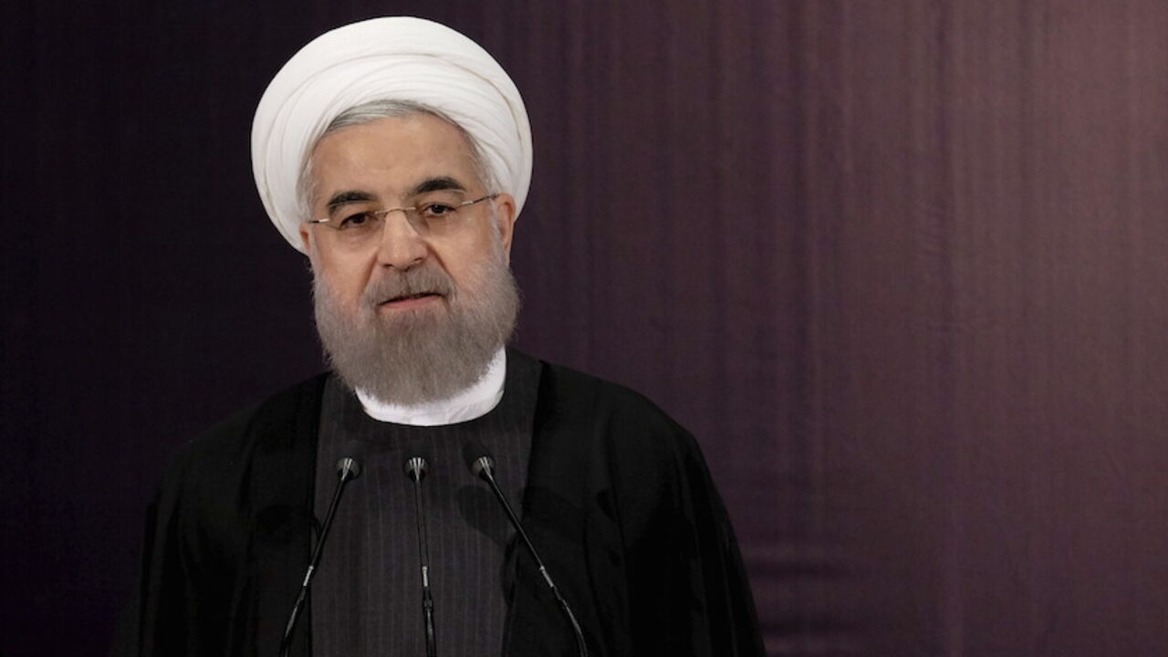 IRAN-ELECTION/ Iranian President Hassan Rouhani talks to journalists after he registered for February's election of the Assembly of Experts, the clerical body that chooses the supreme leader, at Interior Ministry in Tehran December 21, 2015. REUTERS/Raheb Homavandi/TIMA ATTENTION EDITORS - THIS IMAGE WAS PROVIDED BY A THIRD PARTY. FOR EDITORIAL USE ONLY. - RTX1ZKIR