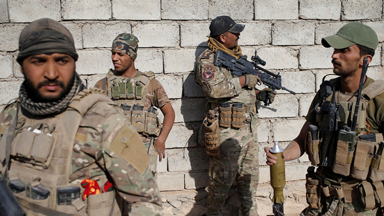 Members of Iraqi special police force stand during clashes with Islamic State fighters in al-Shura, south of Mosul, Iraq October 29, 2016. REUTERS/Goran Tomasevic     TPX IMAGES OF THE DAY      - RTX2QZ1T