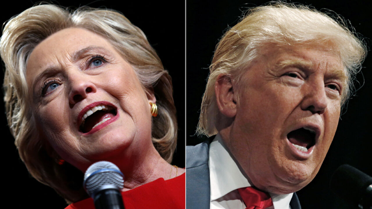 U.S. presidential candidates Hillary Clinton and Donald Trump  (R) speak at campaign rallies in Westbury, New York, U.S., September 26, 2016 and Toledo, Ohio, U.S. September 21, 2016 in a combination of file photos.  REUTERS/Carlos Barria/Jonathan Ernst/Files - RTX2RZAC