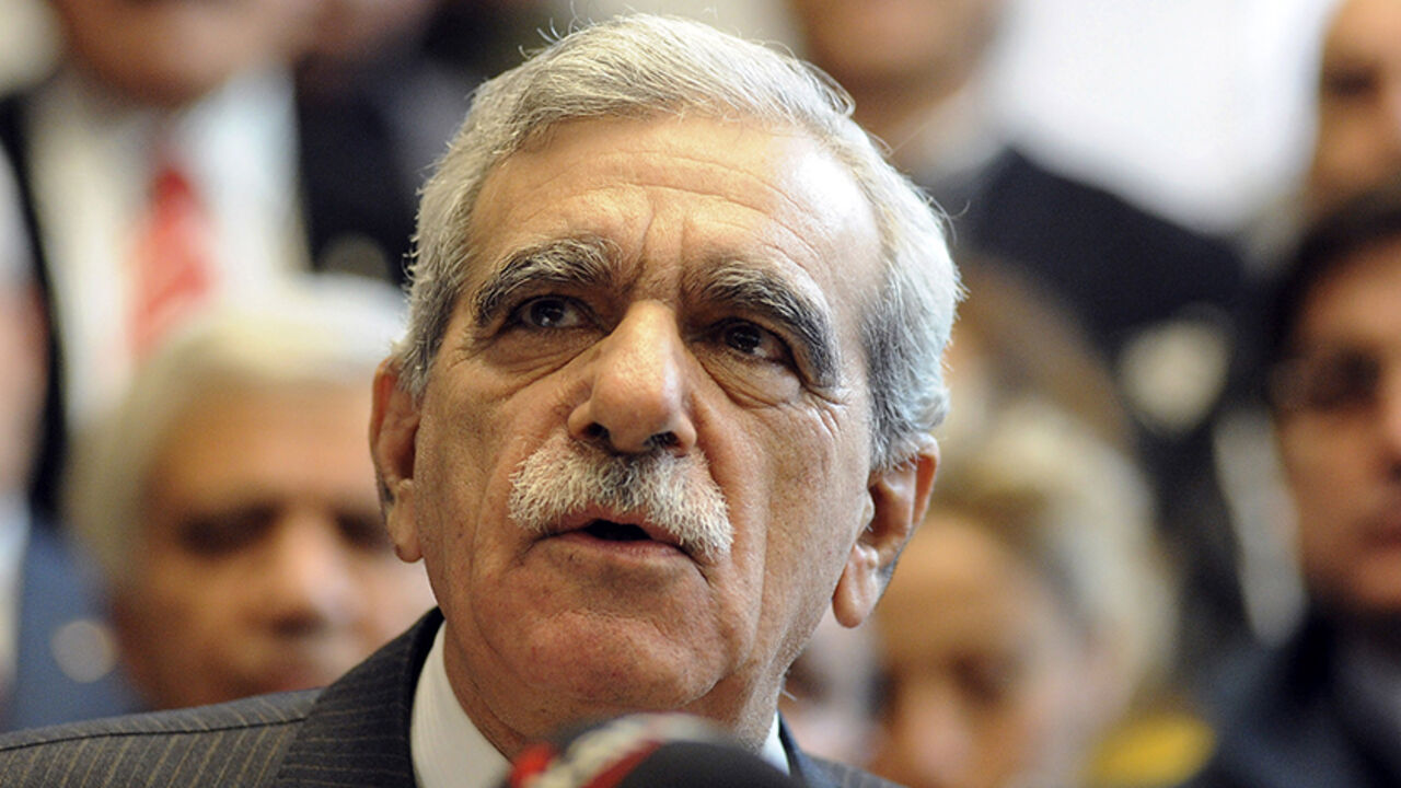TURKEY-KURDS/ Democratic Society Party (DTP) leader Ahmet Turk, who was banned from politics for five years, attends a news conference in Ankara December 18, 2009. Deputies from Turkey's main pro-Kurdish party decided to stay in parliament despite a court decision to ban their movement, its banned leader said on Friday, removing a potential source of political instability. REUTERS/Stringer (TURKEY - Tags: POLITICS) - RTXRZ8Y