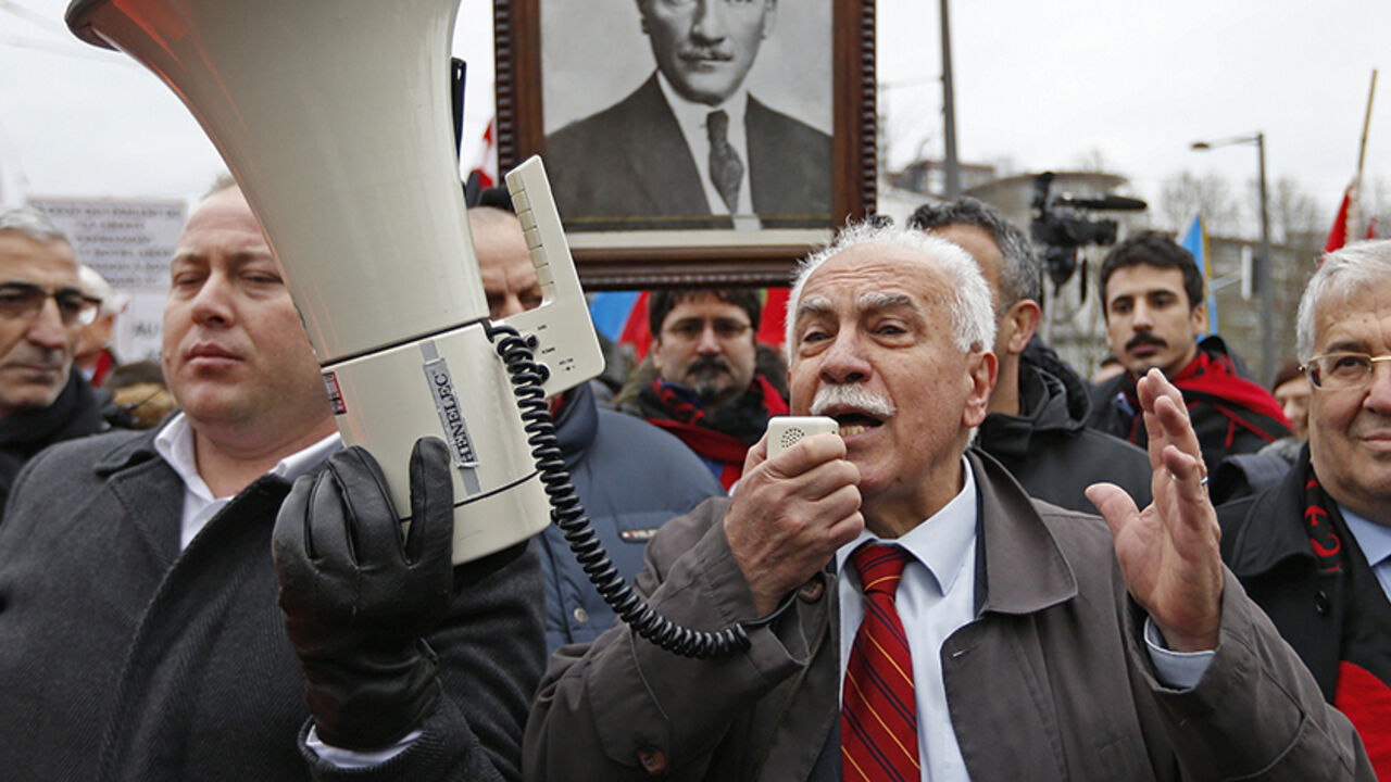 FRANCE-CHR/ARMENIA Dogu Perincek, Chairman of the Turkish Workers' Party addresses supporters at the end of a hearing at the European court of Human Rights in Strasbourg, January 28, 2015. The European Court of Human Rights holds an hearing on Wednesday on the case of Perincek against Switzerland. Perincek was found guilty of racial discrimination by a Swiss Police Court for having publicly denied the characterisation of genocide, without calling into question the existence of massacres and deportations of Armenians in 1915 i
