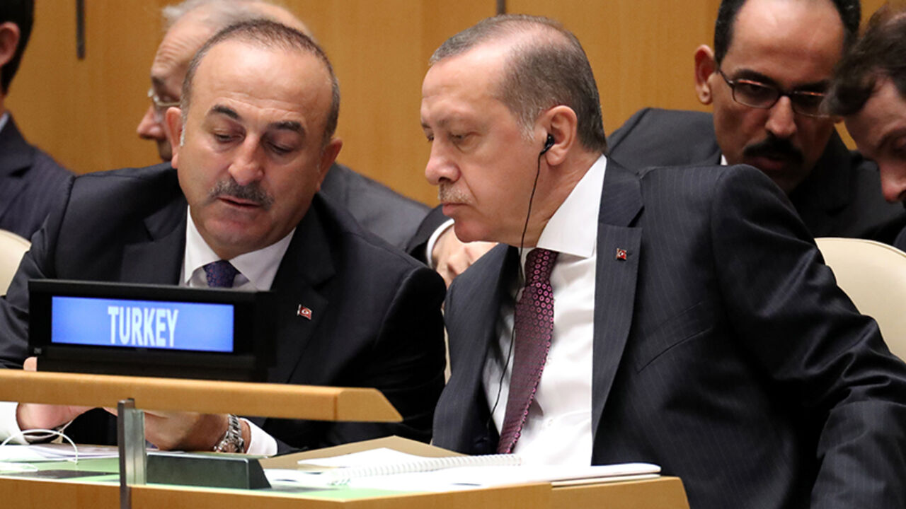 UN-ASSEMBLY President Recep Tayyip Erdogan of Turkey speaks with his Foreign Minister Mevlut Cavusoglu (L) during the 71st United Nations General Assembly in Manhattan, New York, U.S. September 20, 2016. REUTERS/Carlo Allegri - RTSOLUH