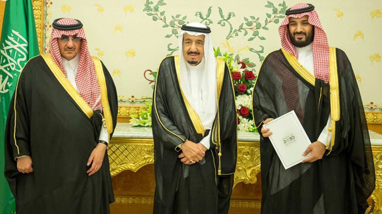 SAUDI-PLAN/PRINCE (L-R) Saudi Crown Prince Mohammed bin Nayef, Saudi King Salman, and Saudi Arabia's Deputy Crown Prince Mohammed bin Salman stand together as Saudi Arabia's cabinet agrees to implement a broad reform plan known as Vision 2030 in Riyadh, April 25, 2016. To match Insight SAUDI-PLAN/PRINCE Saudi Press Agency/Handout/File Photo via REUTERS. ATTENTION EDITORS - THIS IMAGE WAS PROVIDED BY A THIRD PARTY. EDITORIAL USE ONLY. NO RESALES. NO ARCHIVE. - RTX2CU2M
