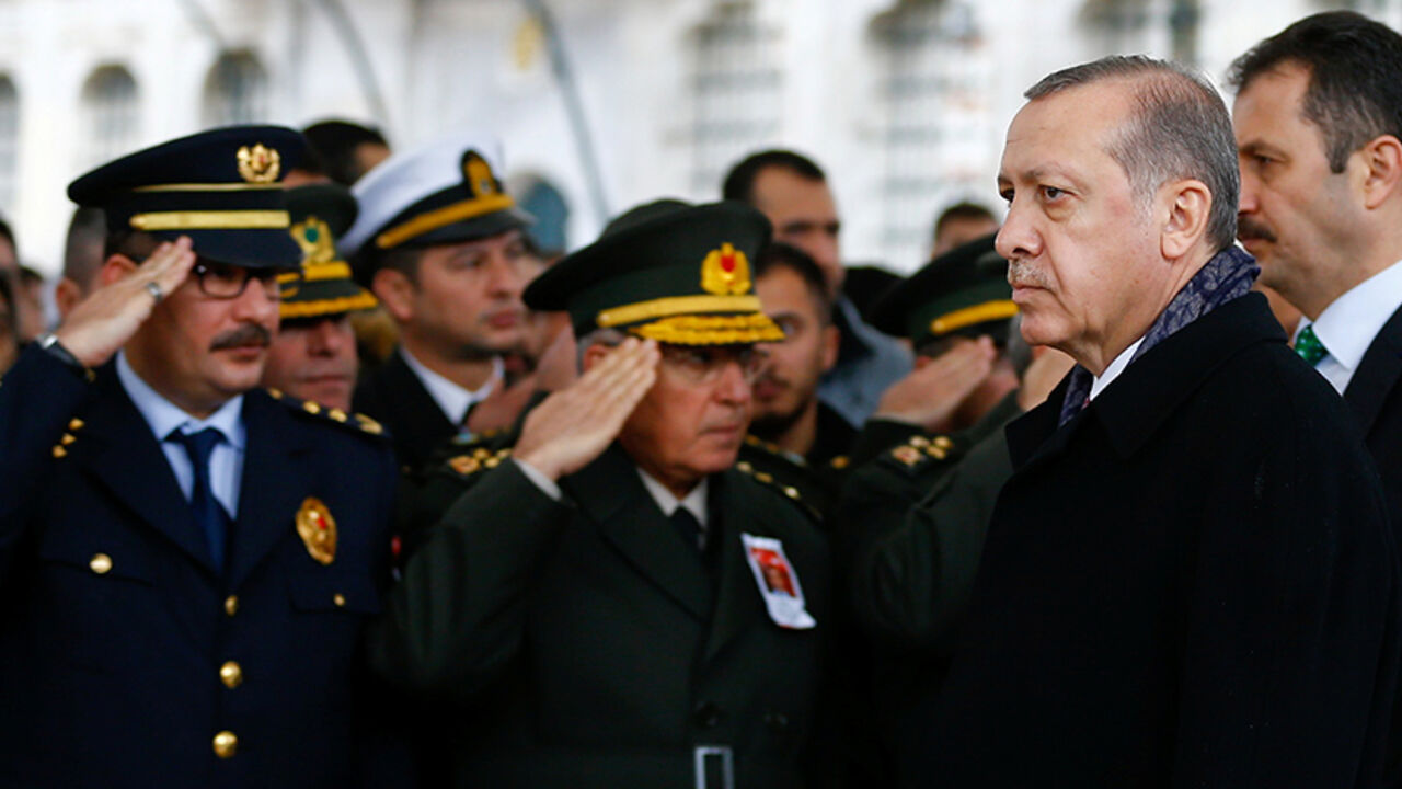 TURKEY-BLAST/ Turkish President Tayyip Erdogan arrives for the funeral ceremony for police officer Hasim Usta who was killed in Saturday's blasts, in Istanbul, Turkey, December 12, 2016. REUTERS/Osman Orsal - RTX2UMSP