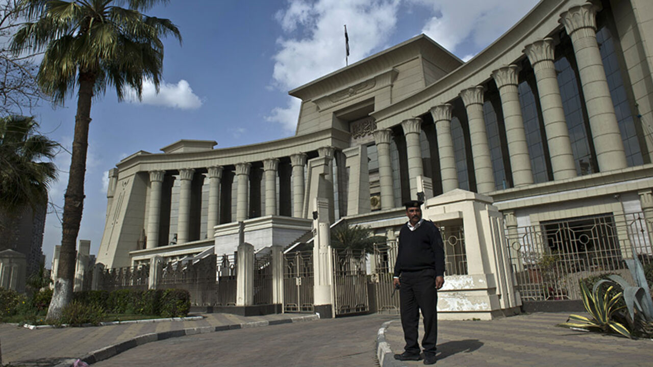 Nic6421577 An Egyptian policeman stands guard outside the Supreme Constitutional Court in Cairo on February 25, 2015 during a court session to determine if the House of Representatives parliamentary election law is constitutional. Egypt's Constitutional Court said it will rule on March 1 whether the country's election law is constitutional, a verdict that could alter the schedule of the upcoming parliamentary polls. AFP PHOTO / KHALED DESOUKI (Photo credit should read KHALED DESOUKI/AFP/Getty Images)