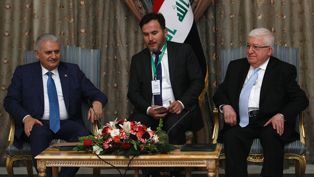AFP_JO898 Iraqi President Fuad Masum (R) meets with Turkish Prime Minister Binali Yildirim (L) at the presidential palace in Baghdad on January 7, 2017.
Iraq and Turkey's prime ministers held talks in Baghdad which both said reflected progress in resolving a bitter row over the presence of Turkish troops in northern Iraq. / AFP / POOL / KHALID AL-MOUSILY (Photo credit should read KHALID AL-MOUSILY/AFP/Getty Images)