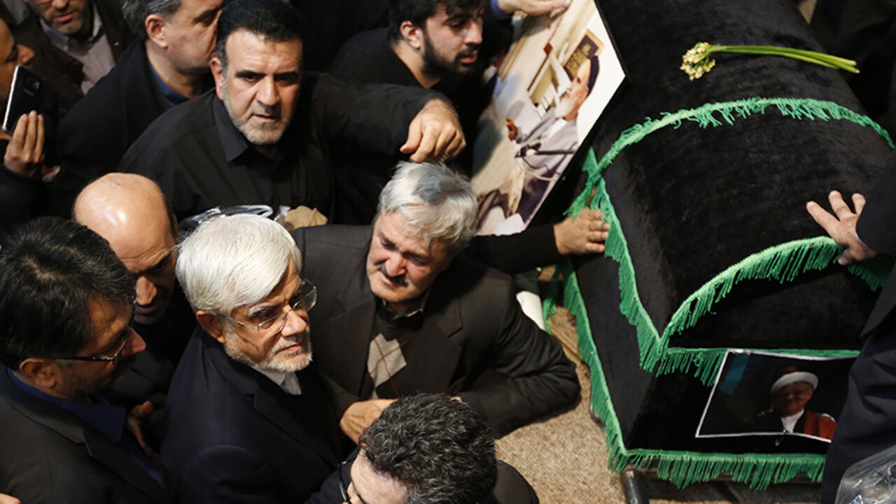 AFP_JQ4XA Iranian leading reformist member of parliament Mohammad Reza Aref (2L) attends a mourning ceremony for former Iranian president Akbar Hashemi Rafsanjani at the Jamaran mosque in Tehran on January 9, 2017.
Rafsanjani died in hospital on January 8 after suffering a heart attack. Rafsanjani, who was 82, was a pivotal figure in the foundation of the Islamic republic in 1979, and served as president from 1989 to 1997. / AFP / ATTA KENARE (Photo credit should read ATTA KENARE/AFP/Getty Images)
