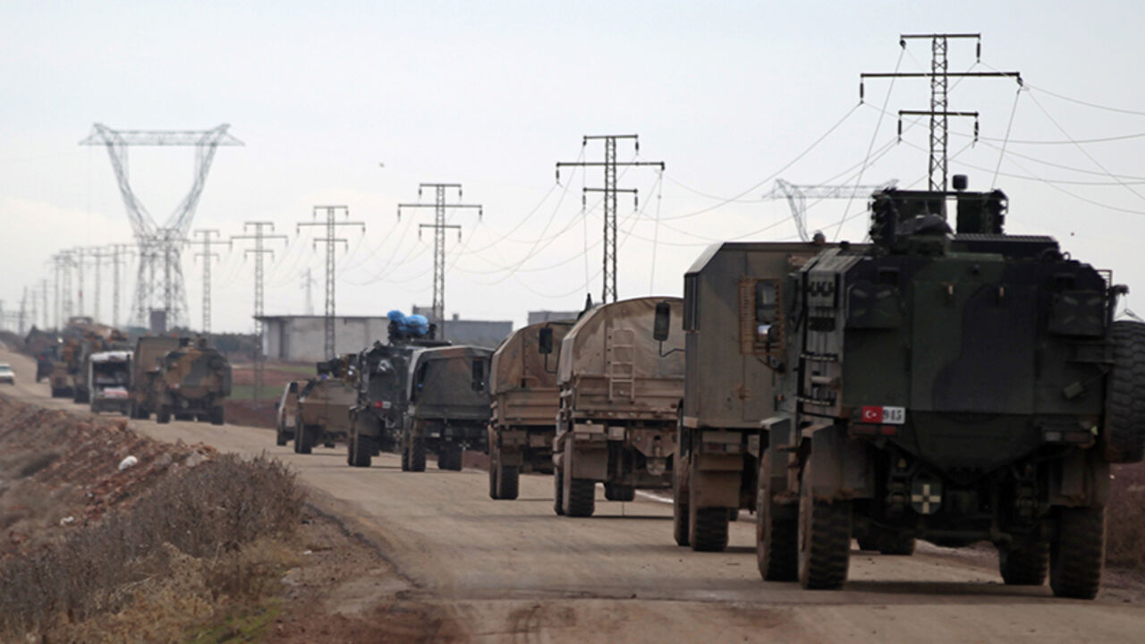 MIDEAST-CRISIS/SYRIA-TURKEY Turkish military vehicles drive in the Syrian rebel-held town of al-Rai, as they head towards the northern Syrian town of al-Bab, Syria January 9, 2017. REUTERS/Khalil Ashawi - RTX2Y60D
